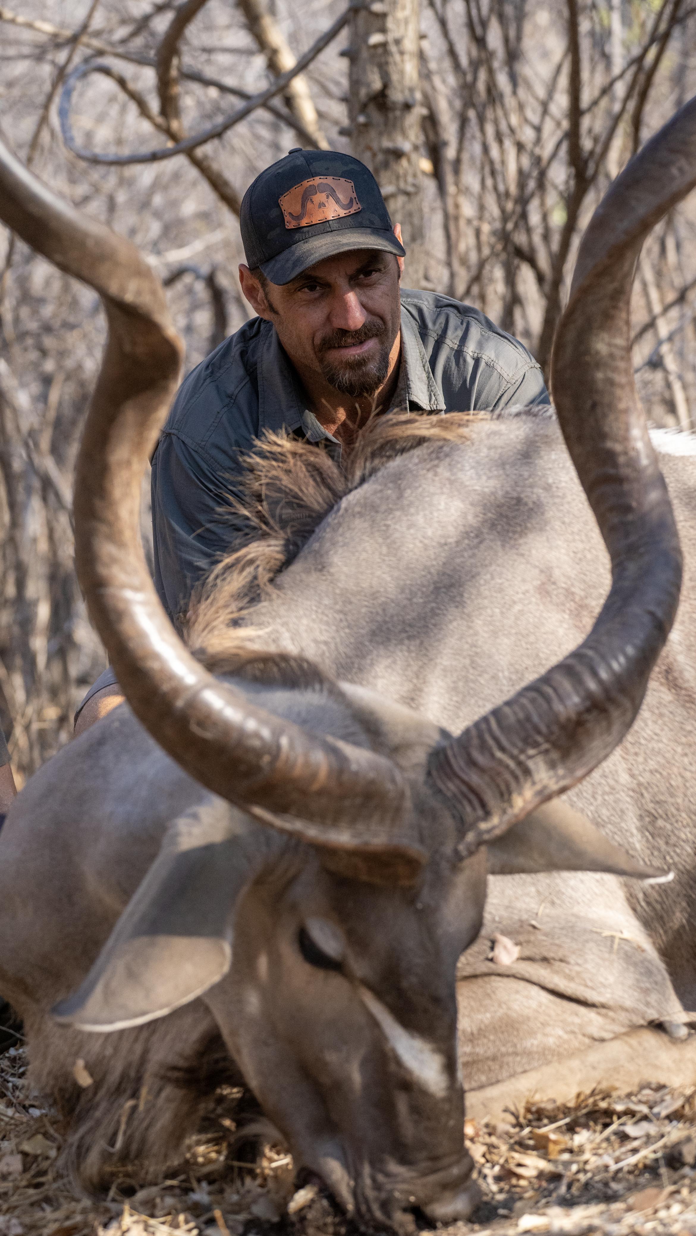 Black Camo Trucker with TIA Bufallo Logo