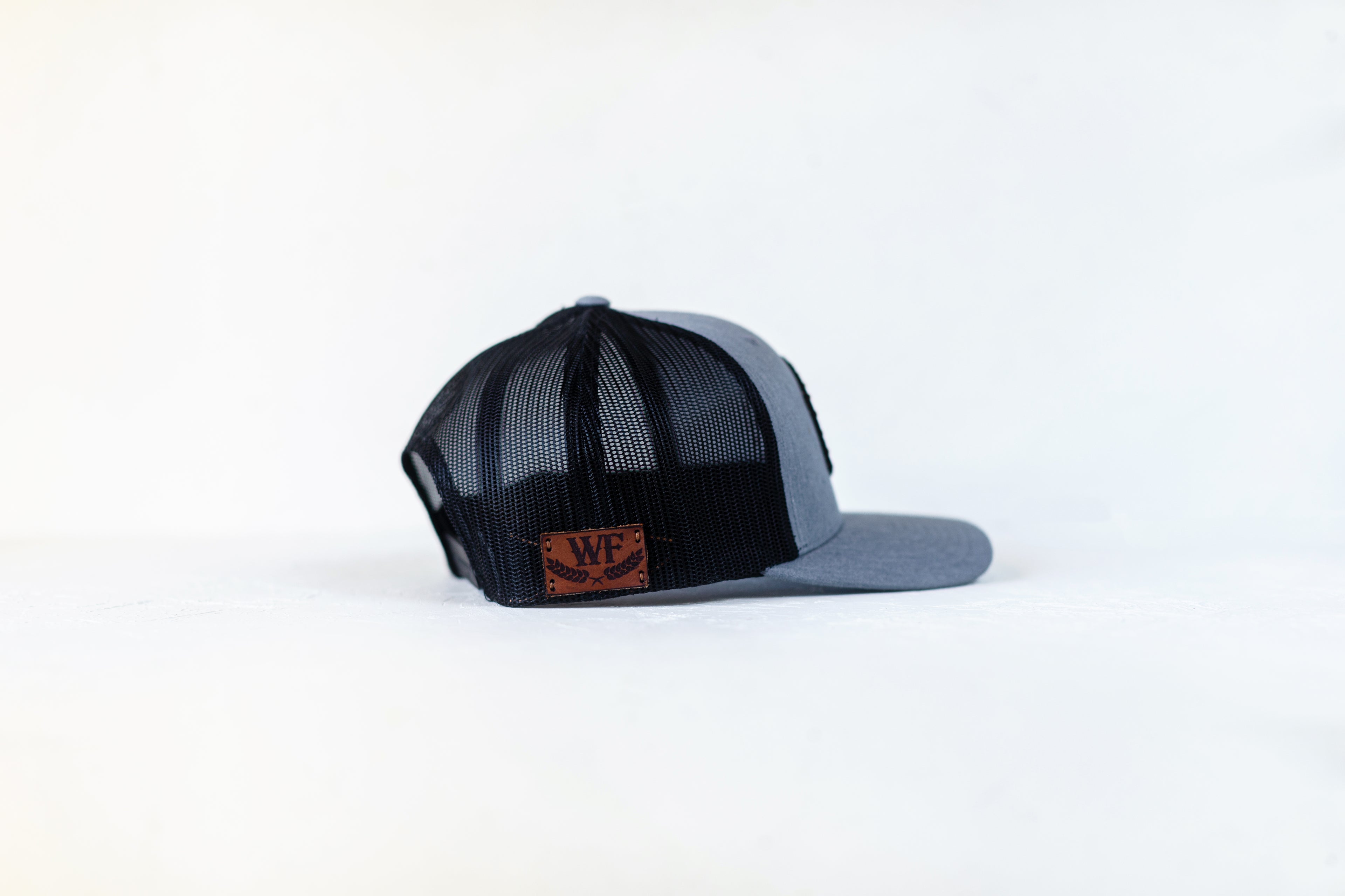 The oryx in Black/Grey trucker with brown thread