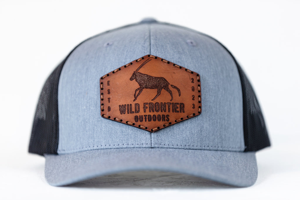 The oryx in Black/Grey trucker with brown thread